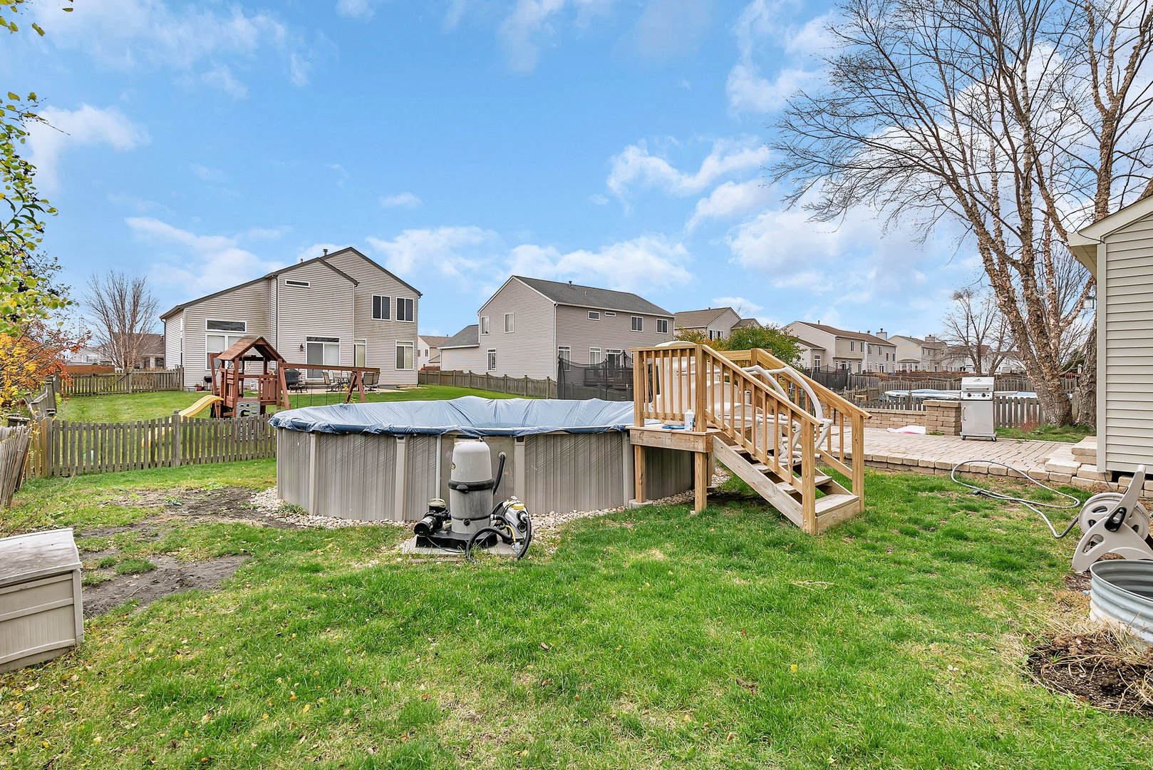 27039 West Hemlock Road Channahon, IL 60410 - Photo 34 of 41 a view of a house with a yard and sitting area