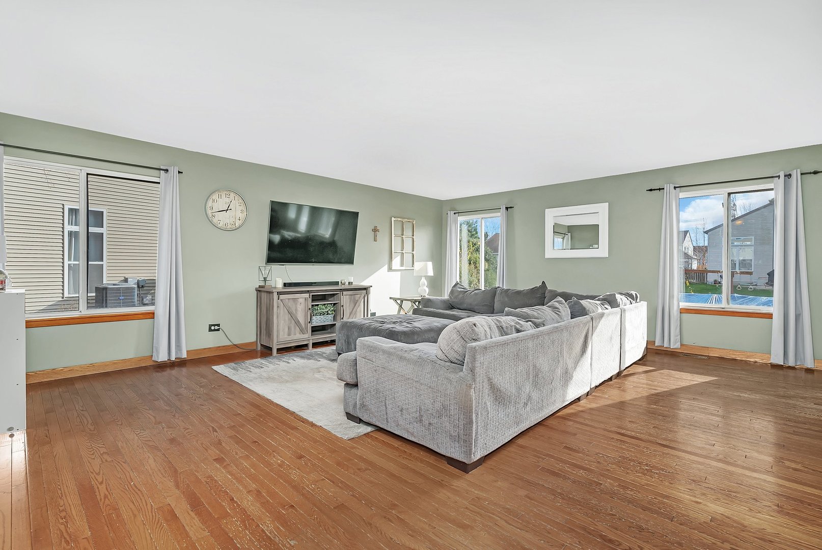 27039 West Hemlock Road Channahon, IL 60410 - Photo 7 of 41 a living room with furniture and a flat screen tv