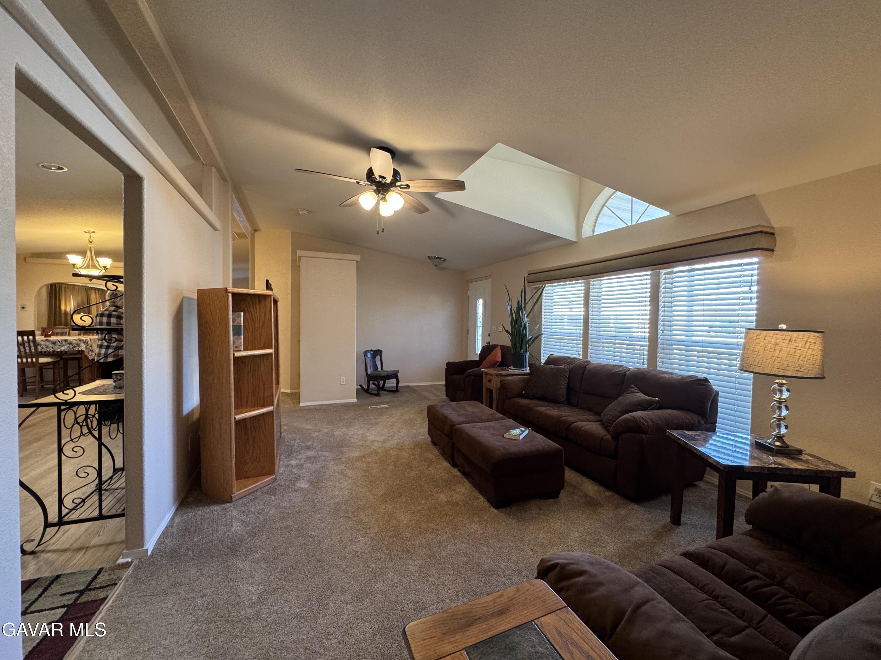 2000 Windflow Drive Rosamond, CA 93560 - Photo 11 of 48 a living room with furniture and a window