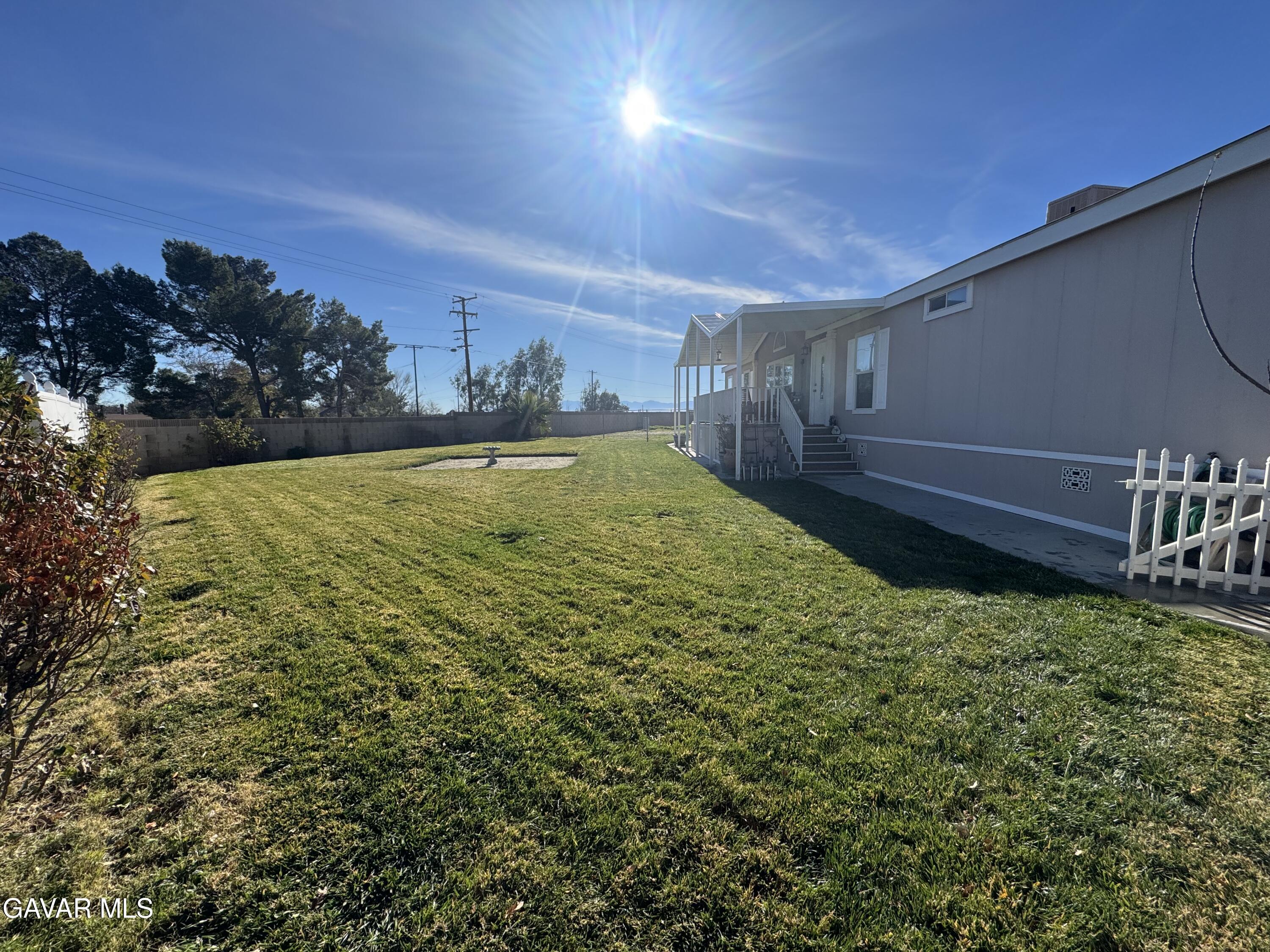 2000 Windflow Drive Rosamond, CA 93560 - Photo 33 of 48 a view of a backyard of the house