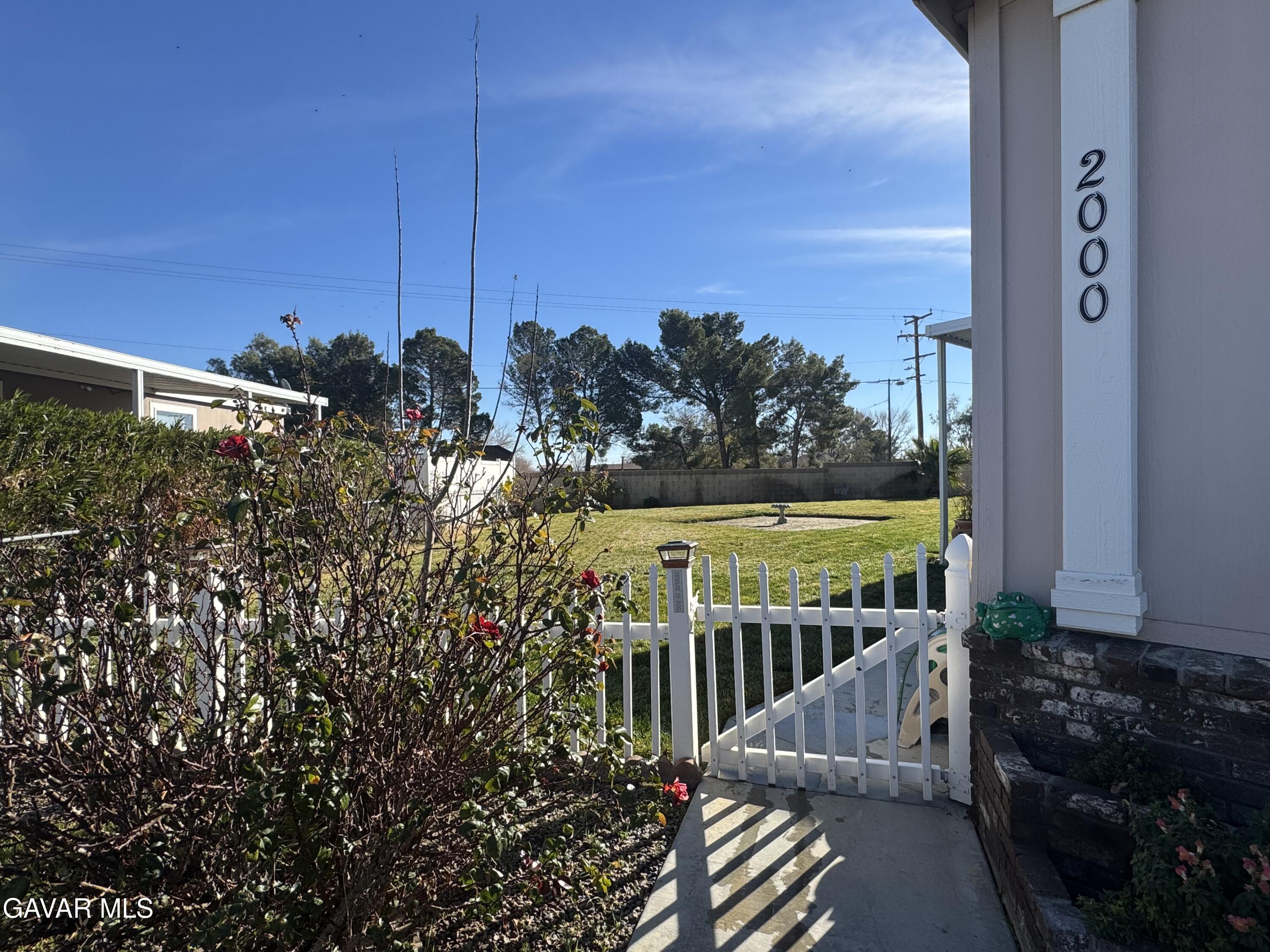 2000 Windflow Drive Rosamond, CA 93560 - Photo 4 of 48 a view of a balcony with chairs