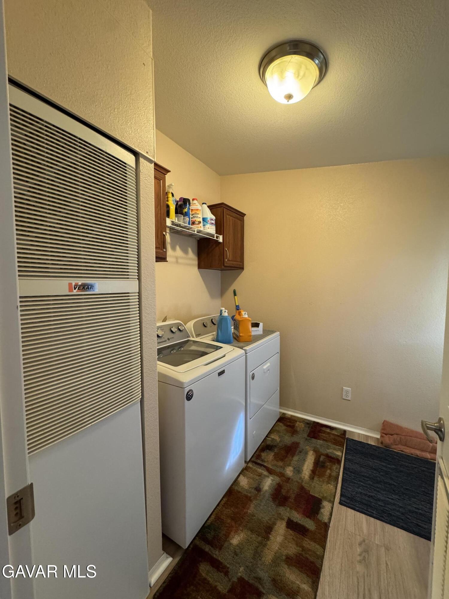 2000 Windflow Drive Rosamond, CA 93560 - Photo 45 of 48 a utility room with dryer and washer