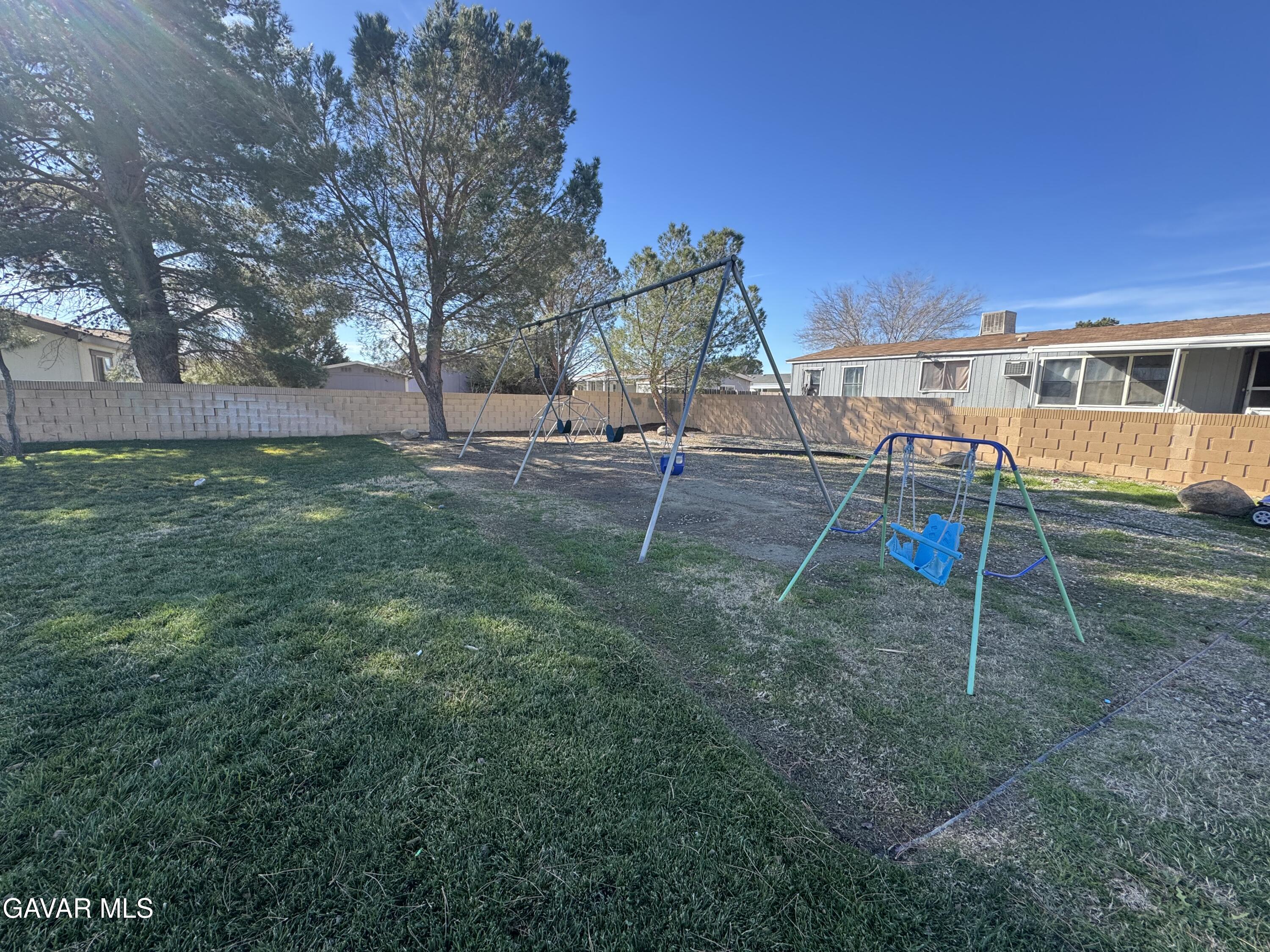 2000 Windflow Drive Rosamond, CA 93560 - Photo 46 of 48 a view of a house with a backyard