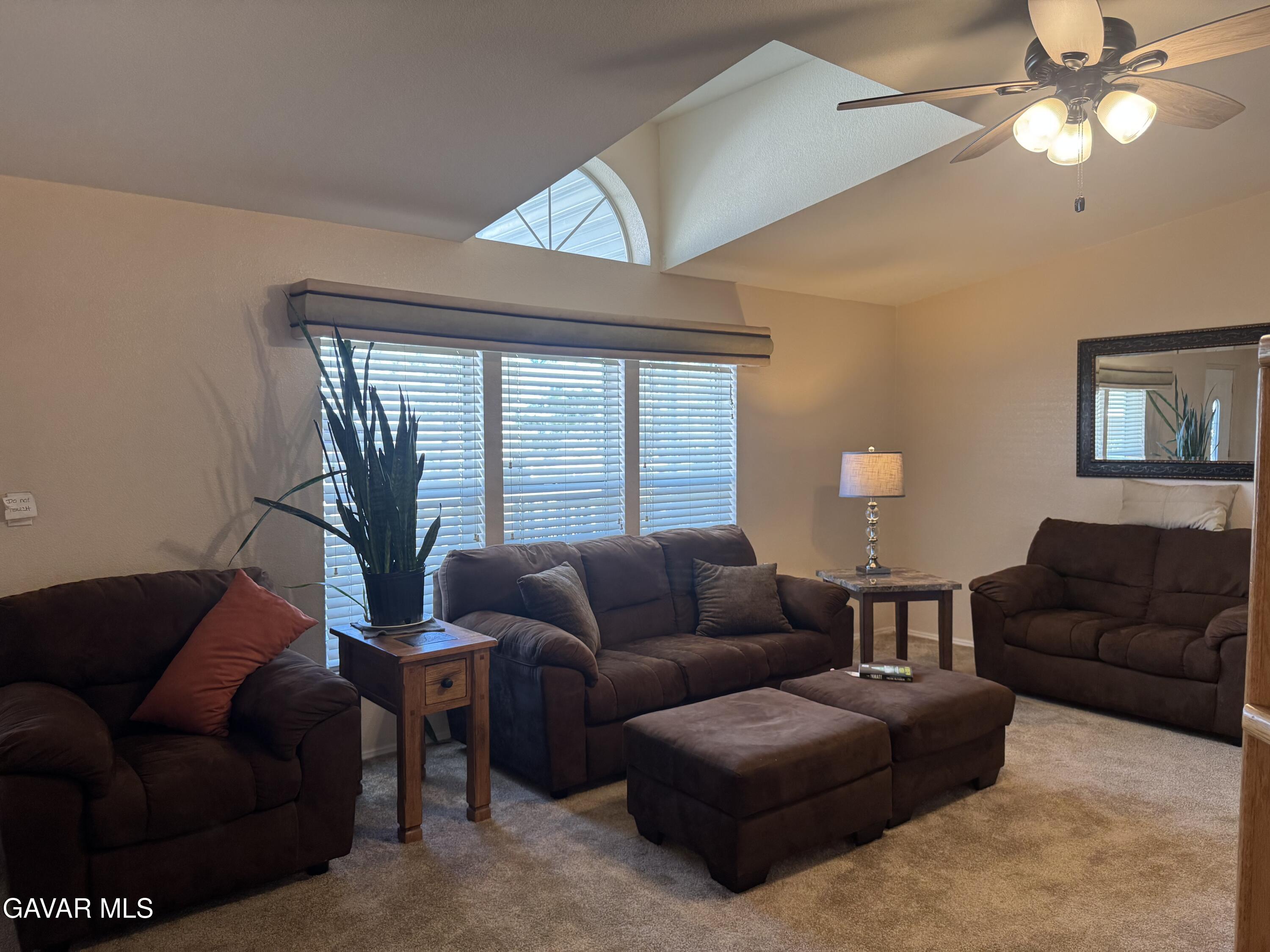 2000 Windflow Drive Rosamond, CA 93560 - Photo 10 of 48 a living room with furniture and a large window