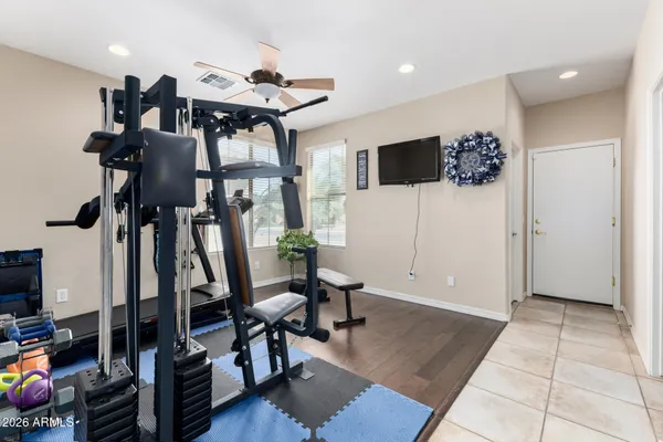 a view of a livingroom with furniture and a flat screen tv