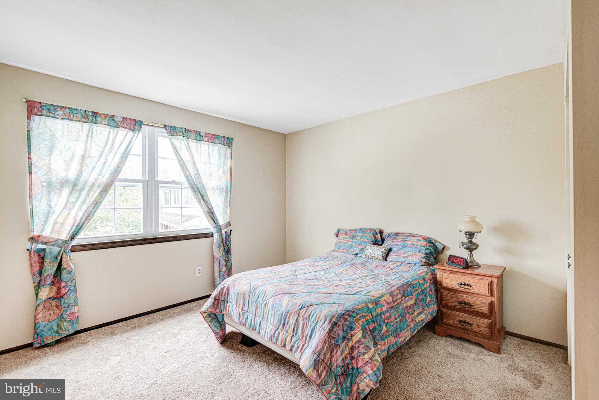 8 Risa Court Newark, DE 19702 - Photo 54 of 58 a bedroom with a bed and a window
