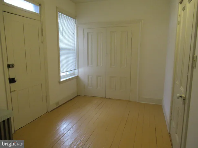 a bathroom with a sink a toilet and bathtub