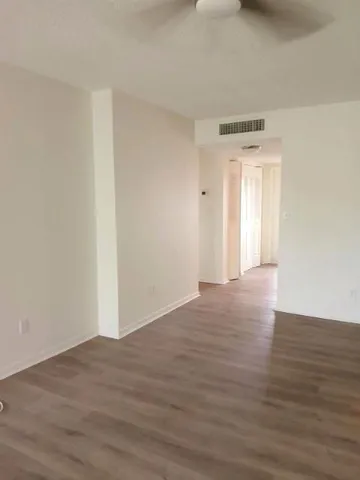 a view of house with outdoor space and lake view