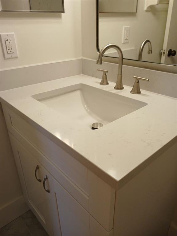 6300 Northwest 62nd Street, Unit 303 Pompano Beach, FL 33068 - Photo 8 of 11 a close view of sink and tap