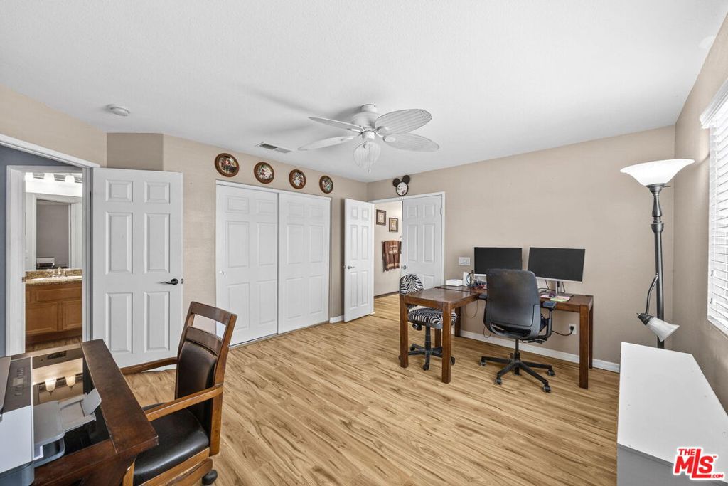 26692 Rim Creek Path, Unit PATHWAY Menifee, CA 92584 - Photo 24 of 41 a view of a livingroom with workspace and a window