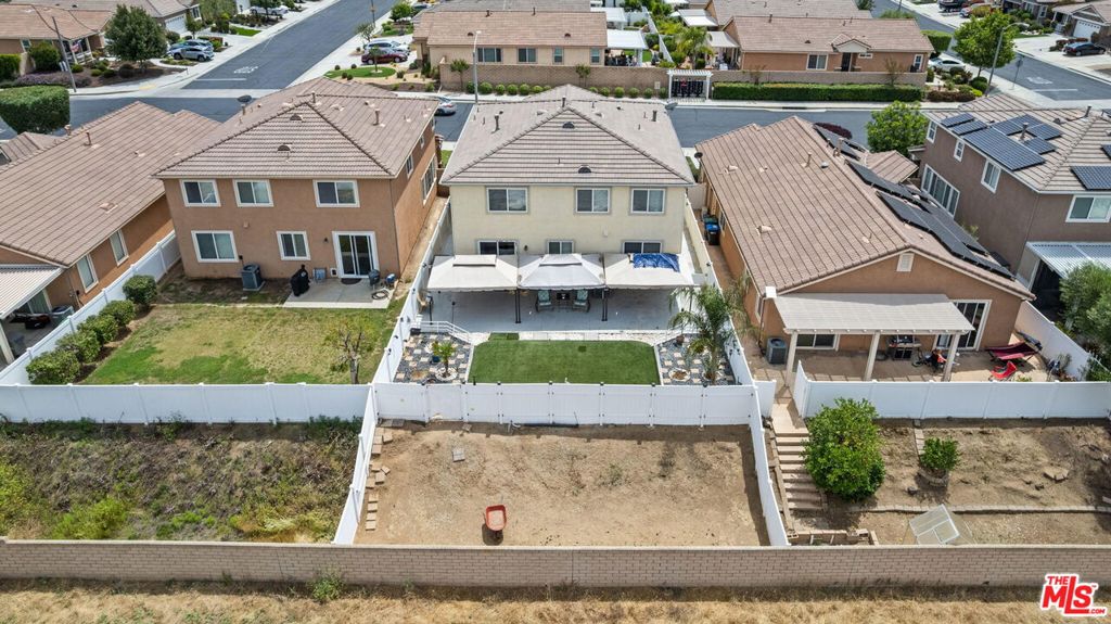 26692 Rim Creek Path, Unit PATHWAY Menifee, CA 92584 - Photo 38 of 41 front view of a house with a yard