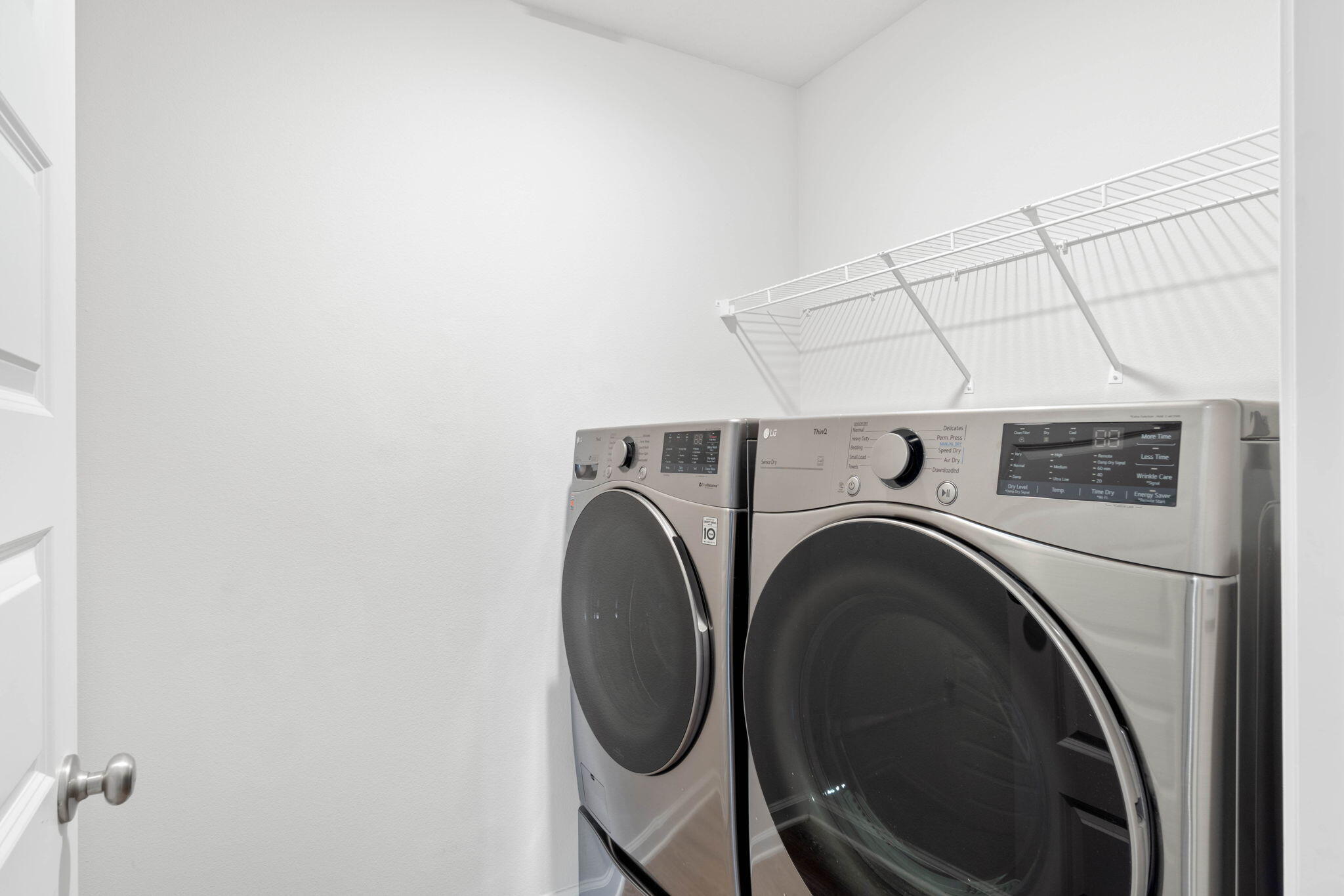 4614 Honor Guard Way Crestview, FL 32539 - Photo 21 of 48 a utility room with dryer and washer