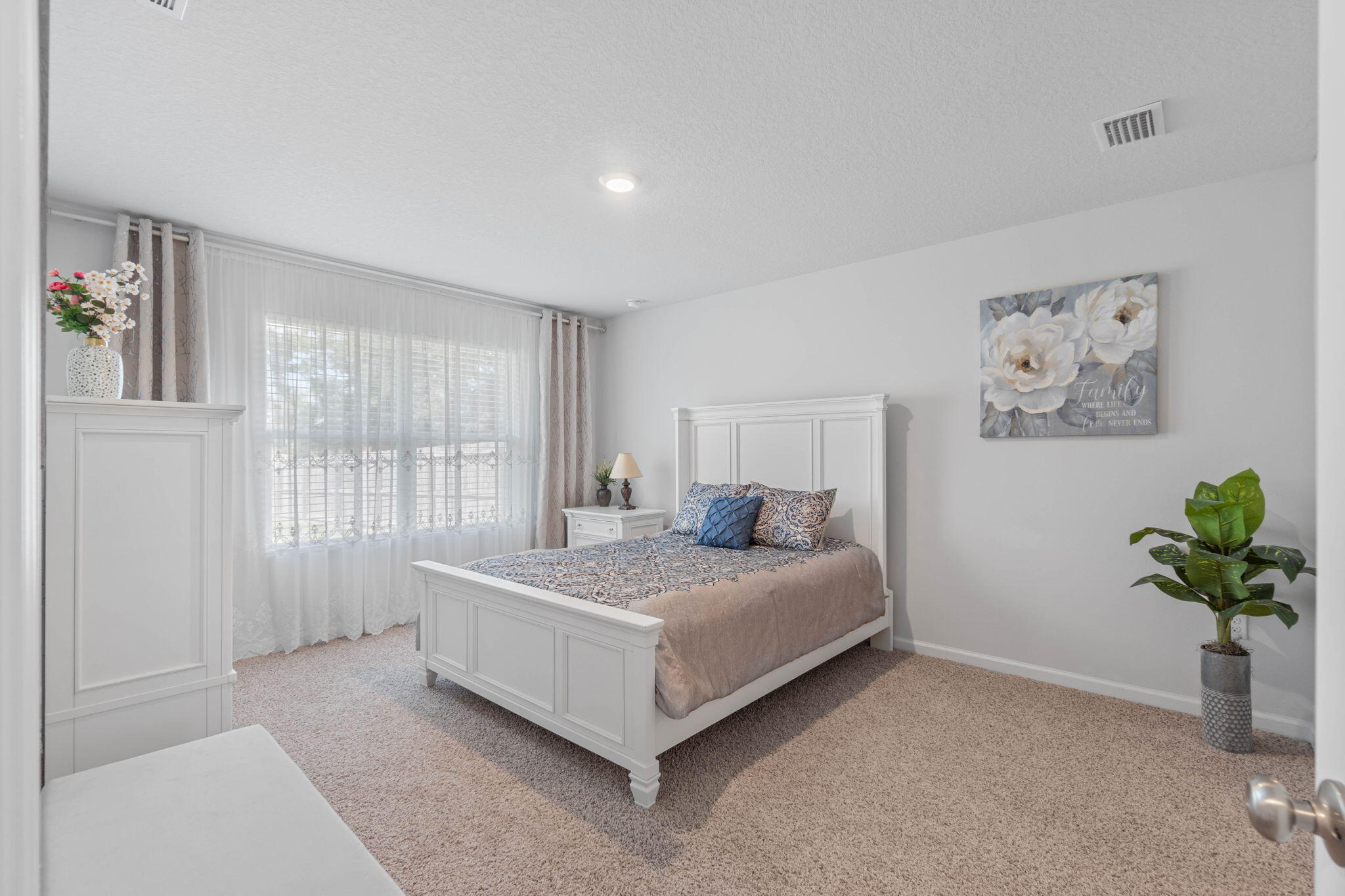 4614 Honor Guard Way Crestview, FL 32539 - Photo 28 of 48 a bedroom with a bed and a window