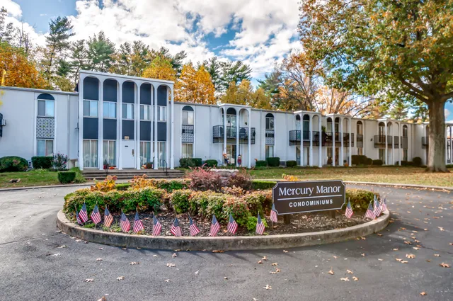 a view of a building with a street