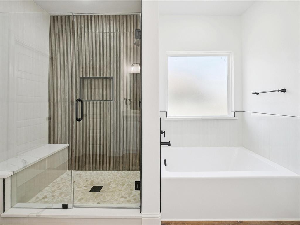 448 Rs County Road Alba, TX 75410 - Photo 25 of 34 a bathroom with a bathtub and a shower