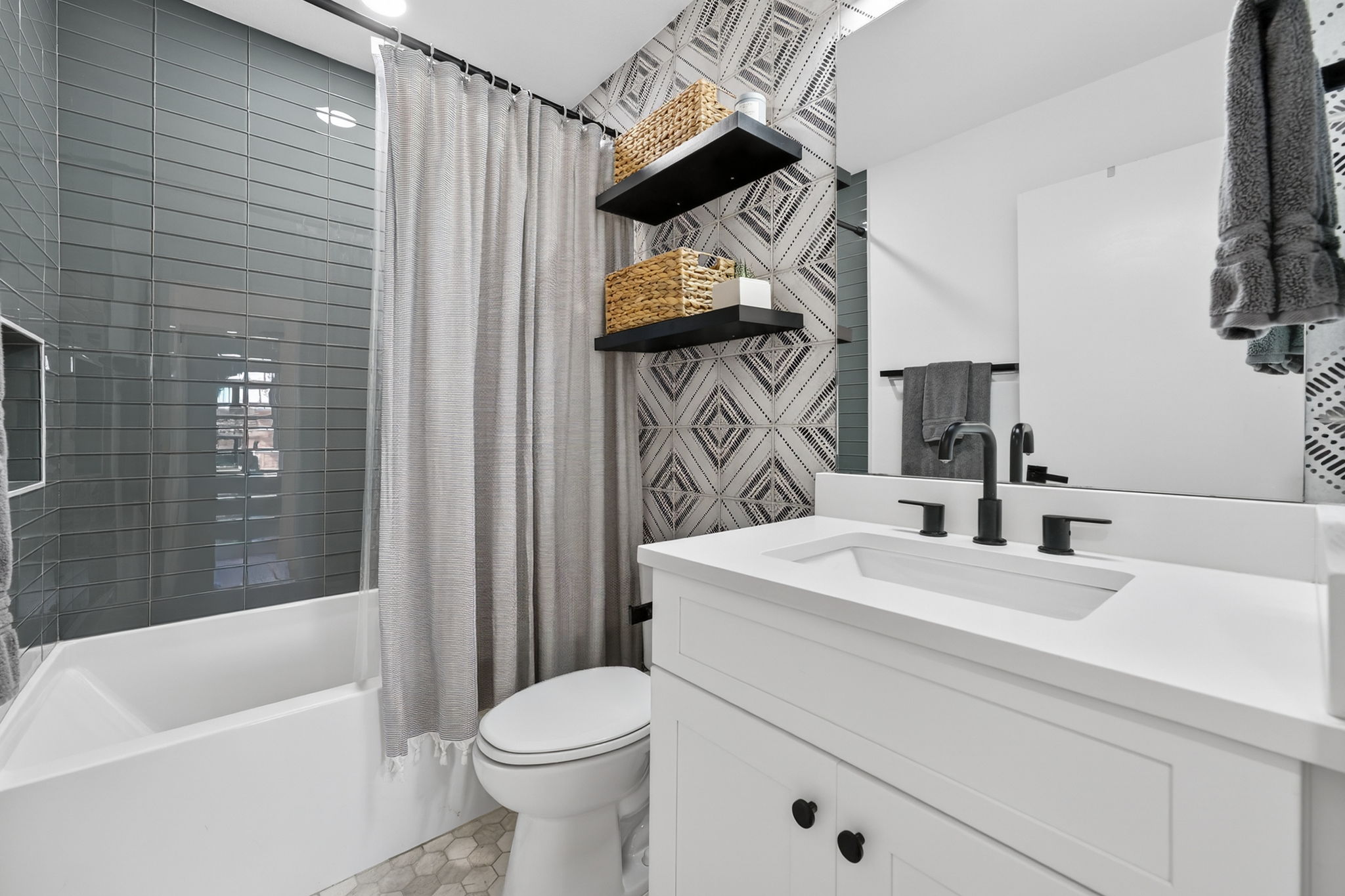 504 West Croslin Street Austin, TX 78752 - Photo 18 of 22 a bathroom with a sink a toilet and shower