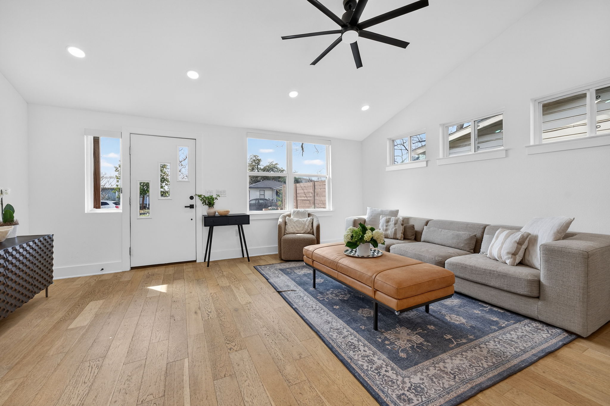 504 West Croslin Street Austin, TX 78752 - Photo 5 of 22 a living room with furniture and a wooden floor
