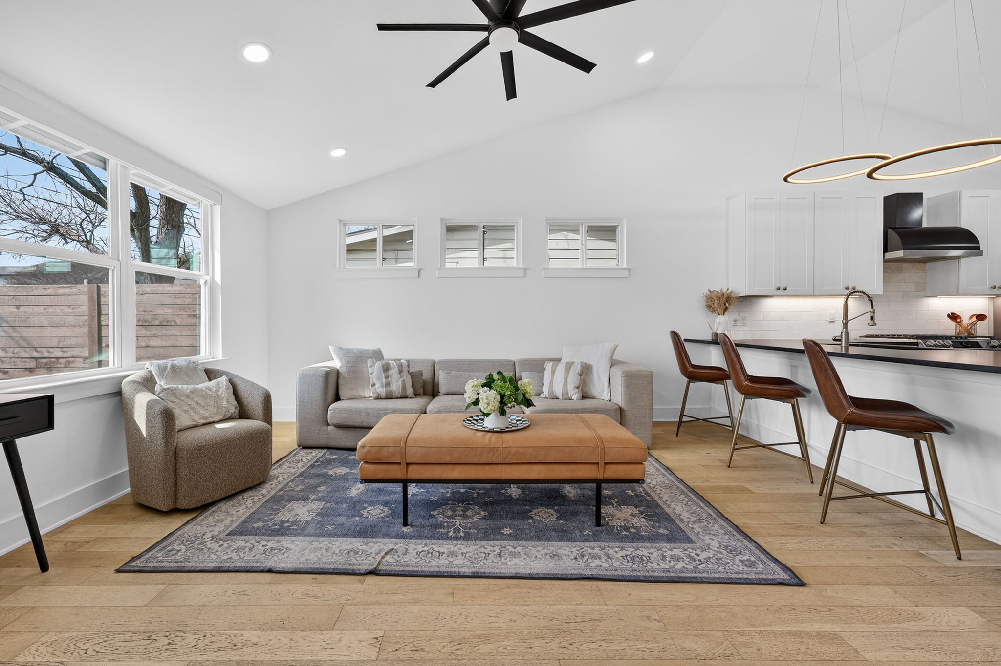 504 West Croslin Street Austin, TX 78752 - Photo 6 of 22 a living room with furniture and a rug