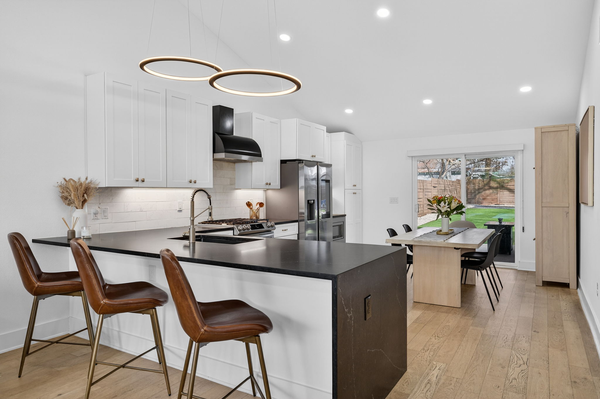 504 West Croslin Street Austin, TX 78752 - Photo 7 of 22 a kitchen with a table and chairs in it