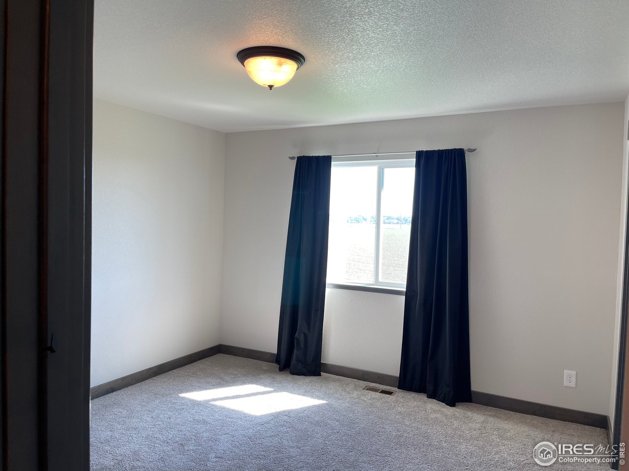 441 Surrey Ridge Eaton, CO 80615 - Photo 14 of 25 Bedroom 2 - upstairs