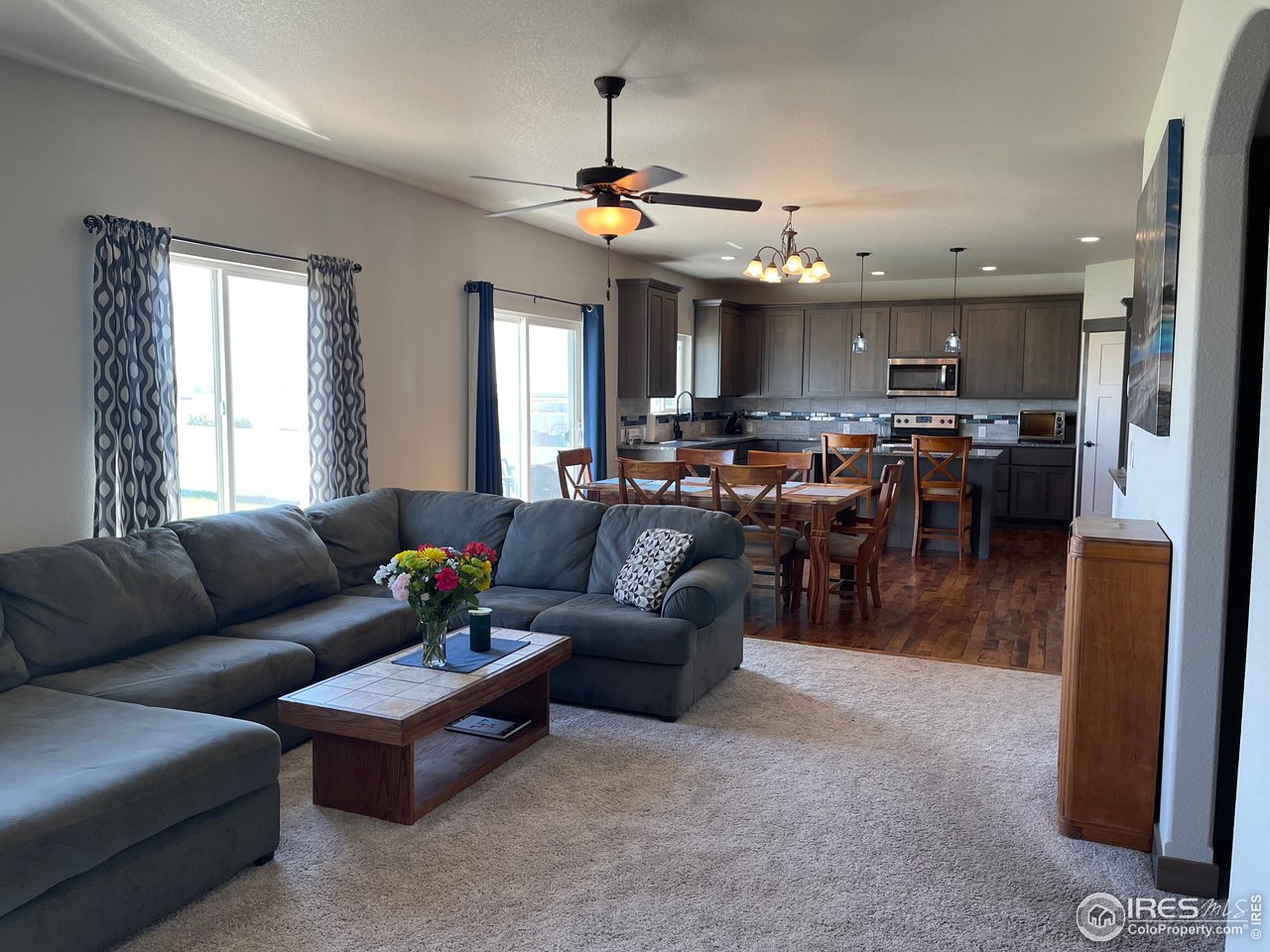 441 Surrey Ridge Eaton, CO 80615 - Photo 5 of 25 Great Room / Kitchen / Dining