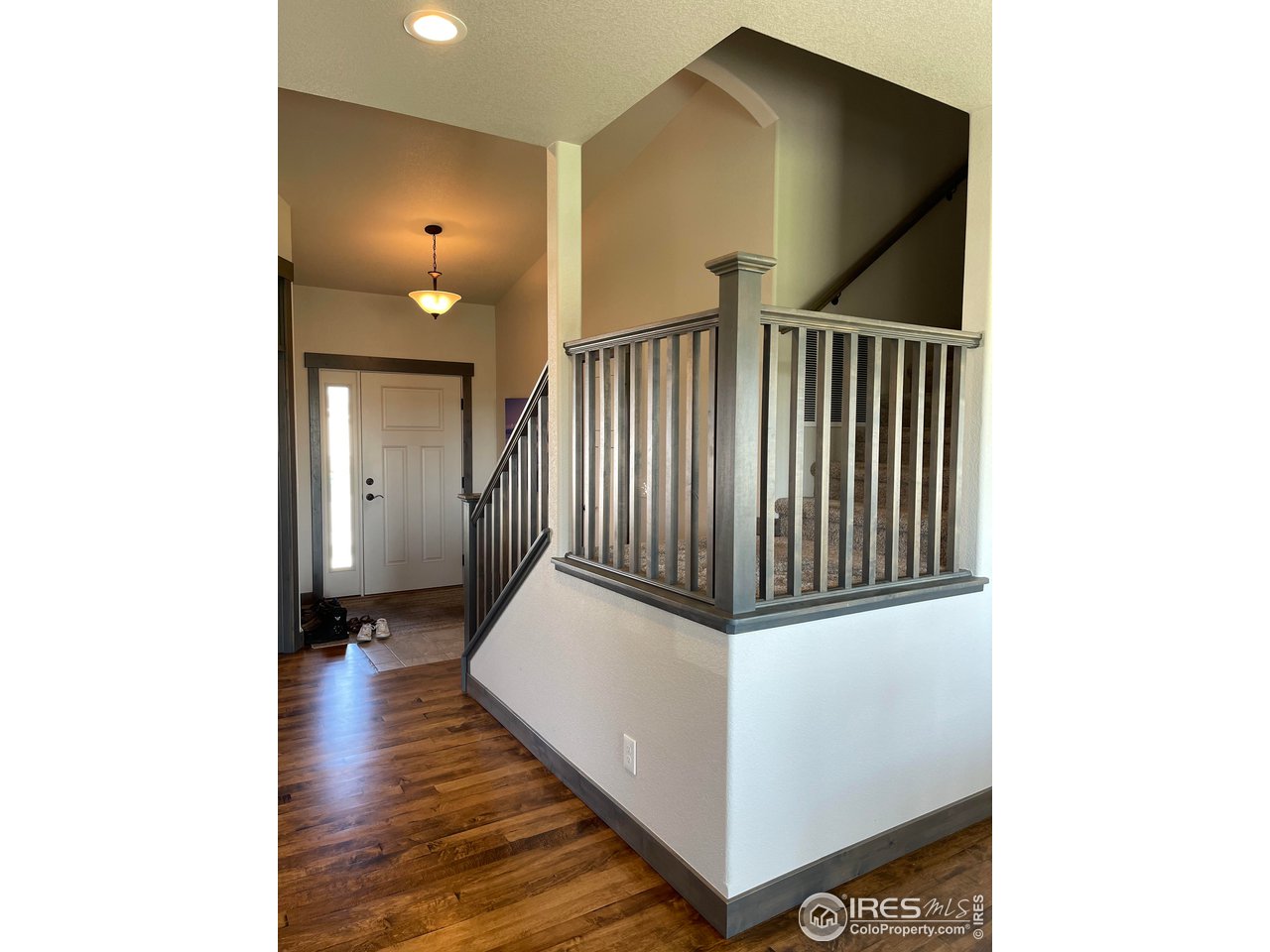 441 Surrey Ridge Eaton, CO 80615 - Photo 7 of 25 Front Entry / Staircase