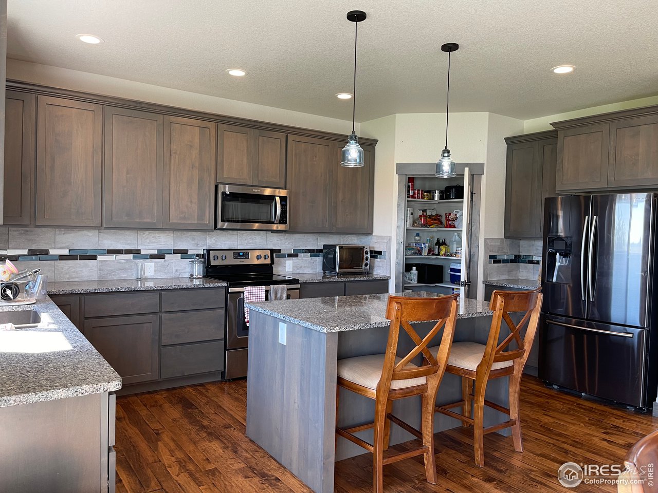 441 Surrey Ridge Eaton, CO 80615 - Photo 8 of 25 Kitchen / Pantry