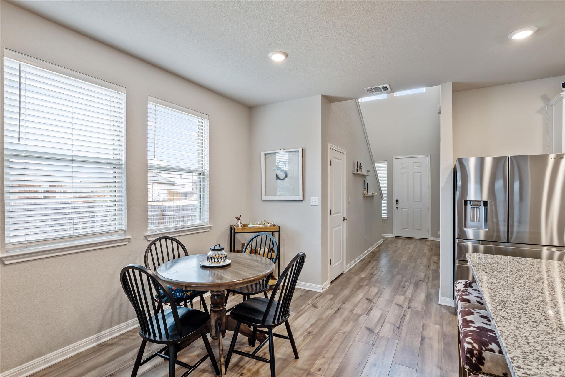 331 Mountain Valley Street Georgetown, TX 78628 - Photo 13 of 40 Cozy Breakfast area with wood-style floors and recessed lighting