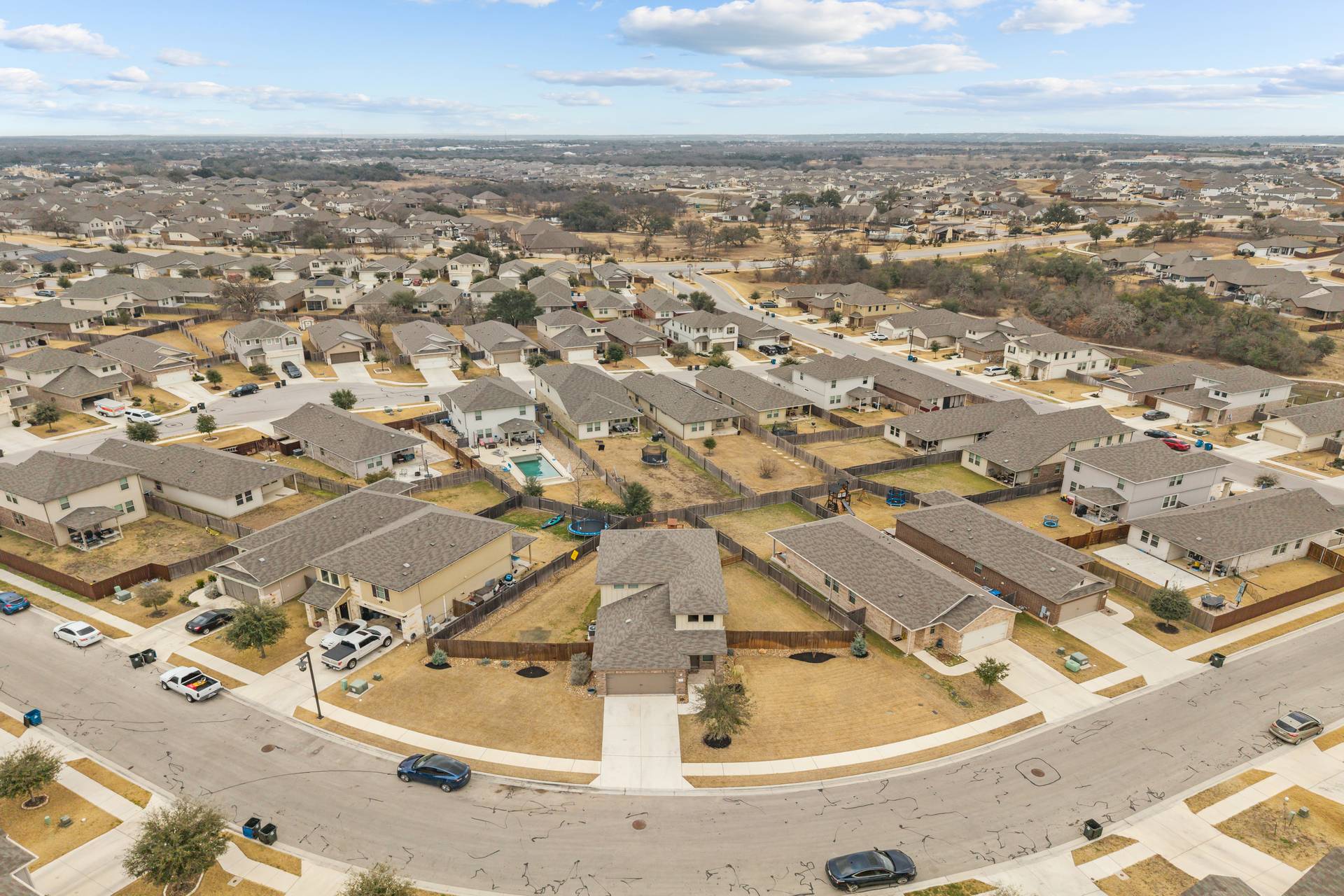 331 Mountain Valley Street Georgetown, TX 78628 - Photo 2 of 40 Aerial overview of the home reflecting the large front and back yard.