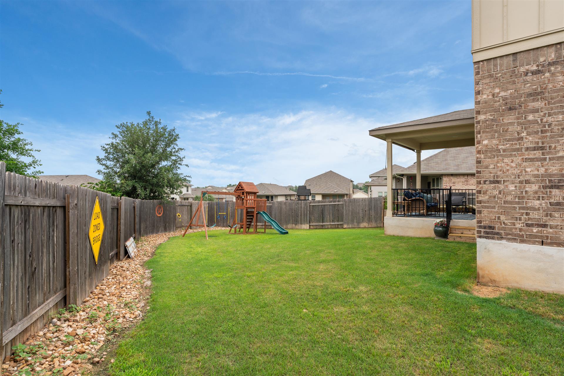 331 Mountain Valley Street Georgetown, TX 78628 - Photo 33 of 40 a view of a house with backyard and porch