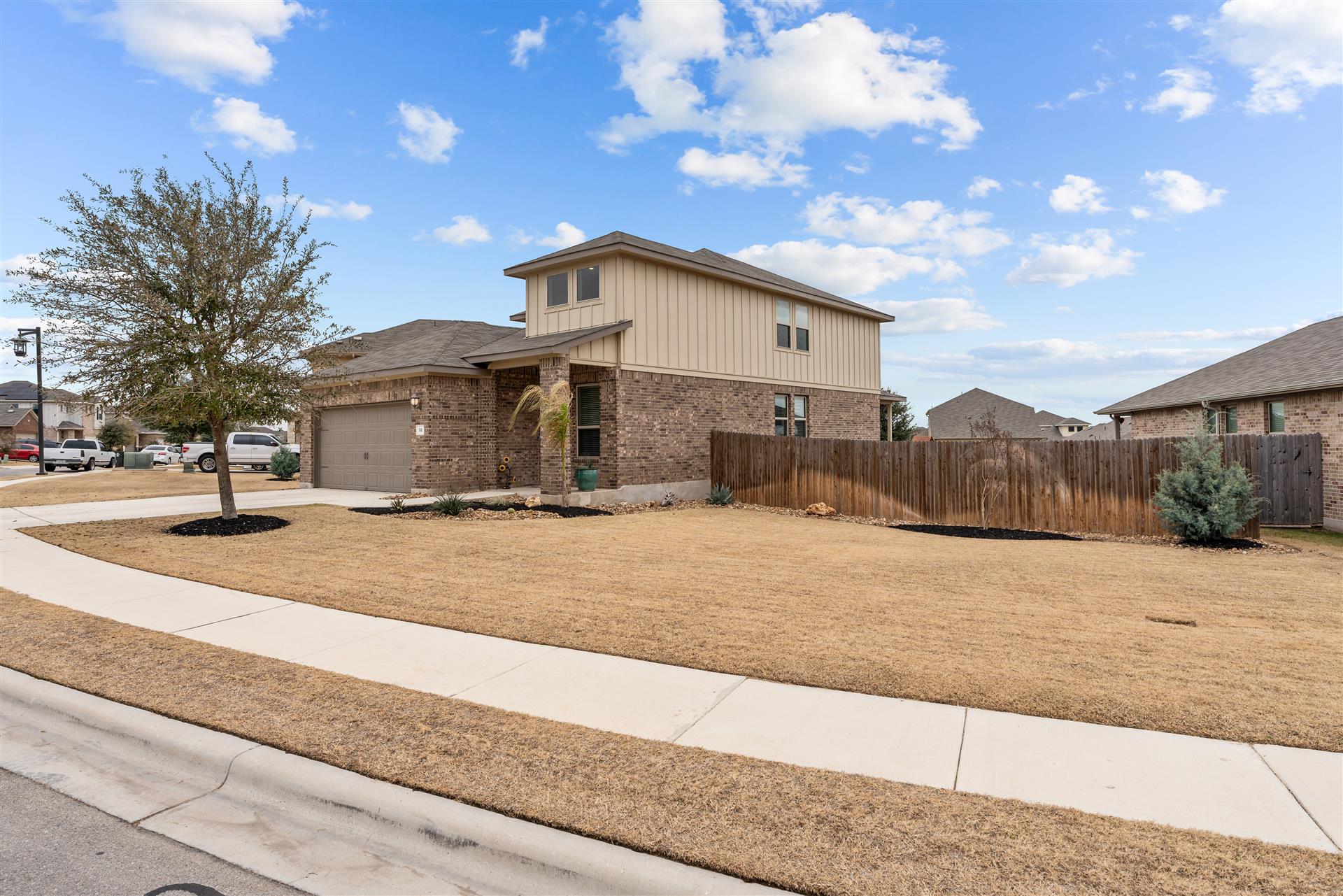 331 Mountain Valley Street Georgetown, TX 78628 - Photo 4 of 40 View of the right side of home, lots of space between neighbors