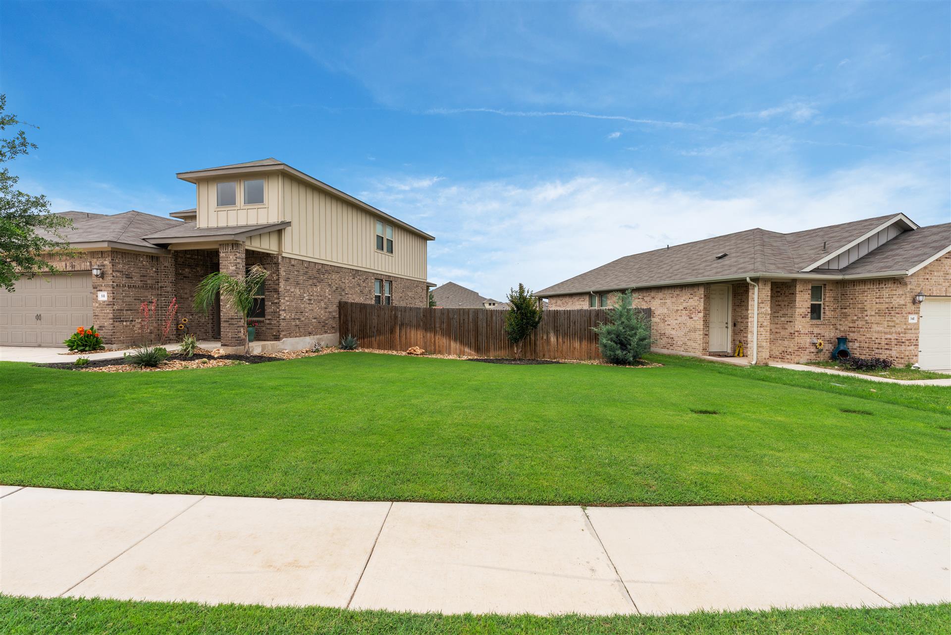 331 Mountain Valley Street Georgetown, TX 78628 - Photo 5 of 40 a view of an house with backyard space and garden