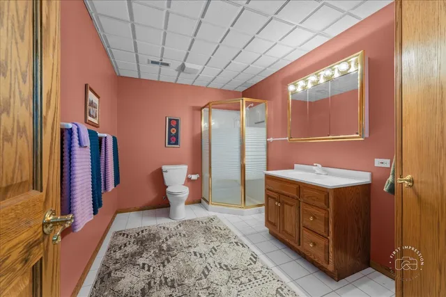 a front view of a house with outdoor seating