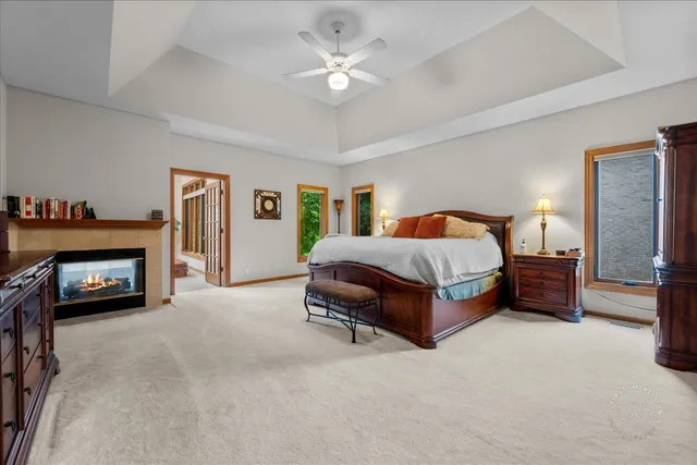 a bedroom with a bed and a couch