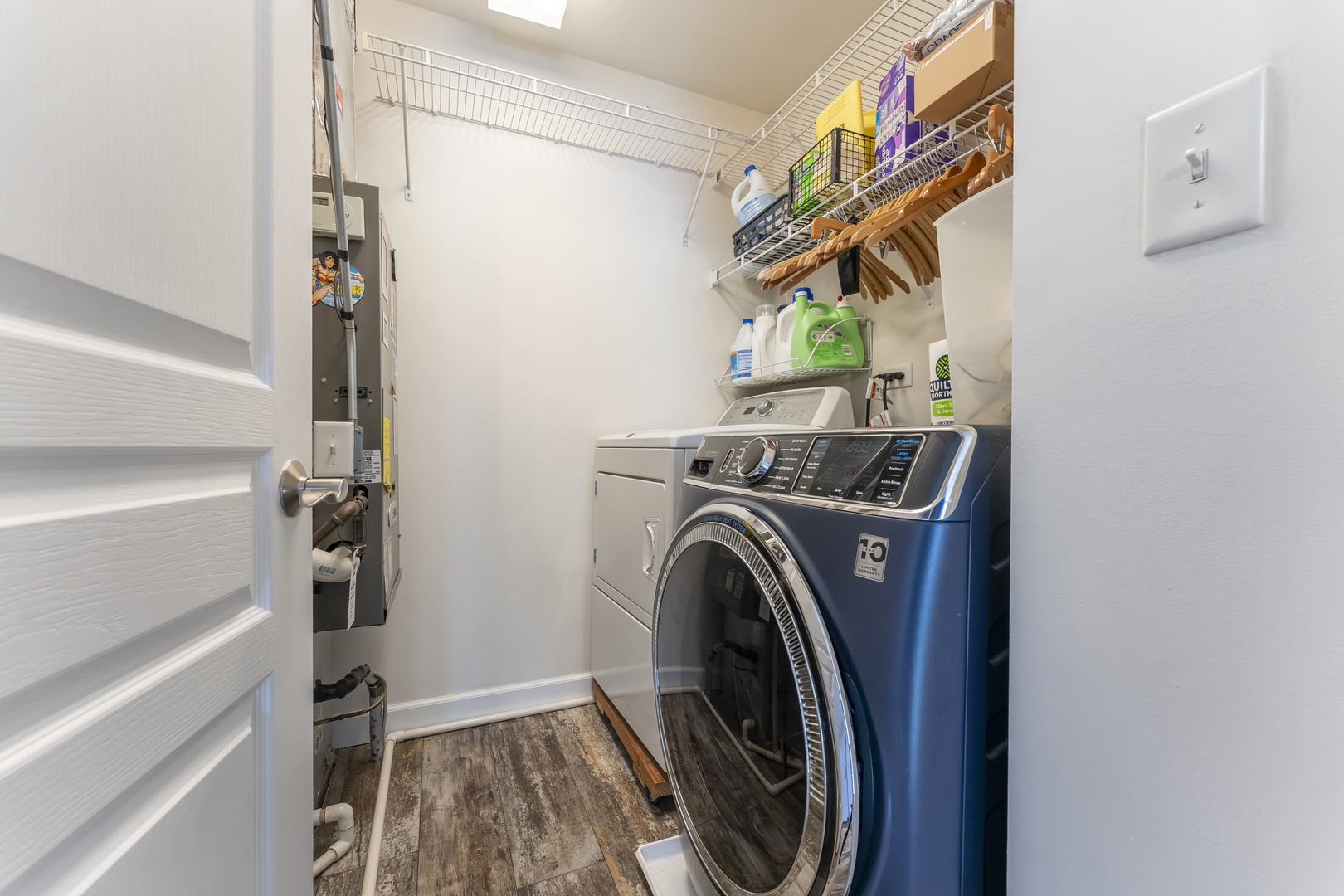 794 Pointe Drive, Unit 794 Crystal Lake, IL 60014 - Photo 18 of 20 a view of storage and utility room with washer and dryer