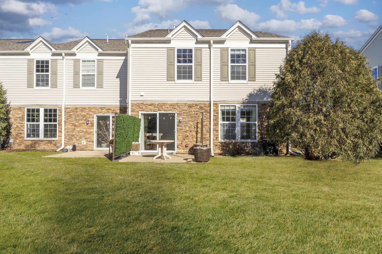 794 Pointe Drive, Unit 794 Crystal Lake, IL 60014 - Photo 19 of 20 a front view of a house with a yard