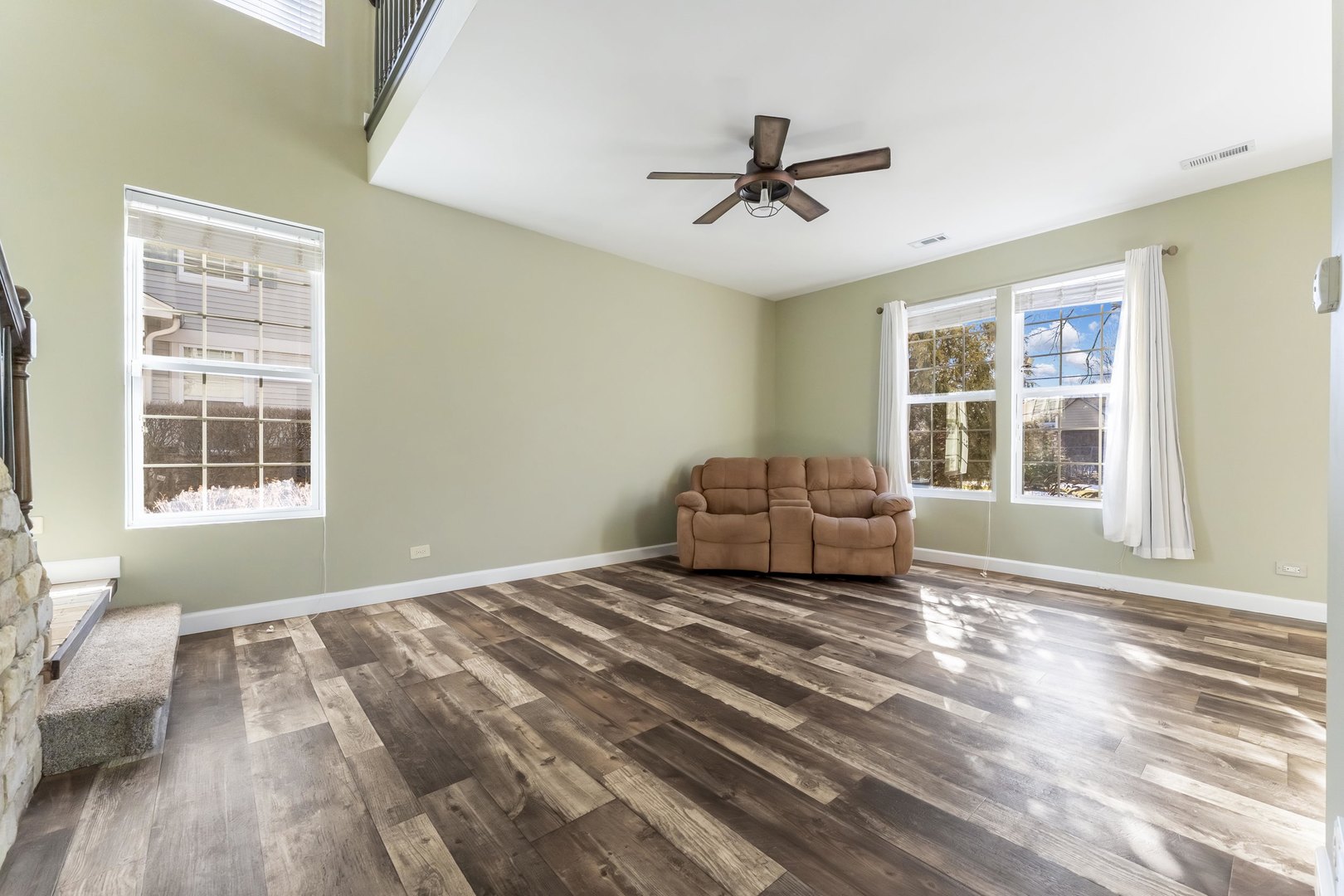 794 Pointe Drive, Unit 794 Crystal Lake, IL 60014 - Photo 3 of 20 a bedroom with a bed and wooden floor