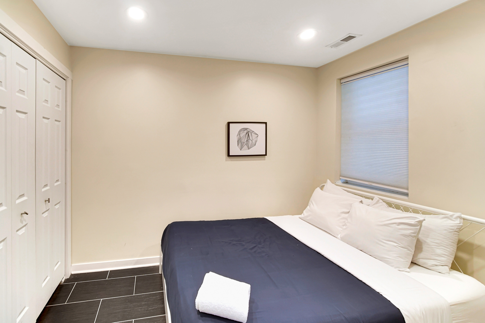 2123 West Adams Street Chicago, IL 60612 - Photo 13 of 29 a bedroom with a bed and a couch