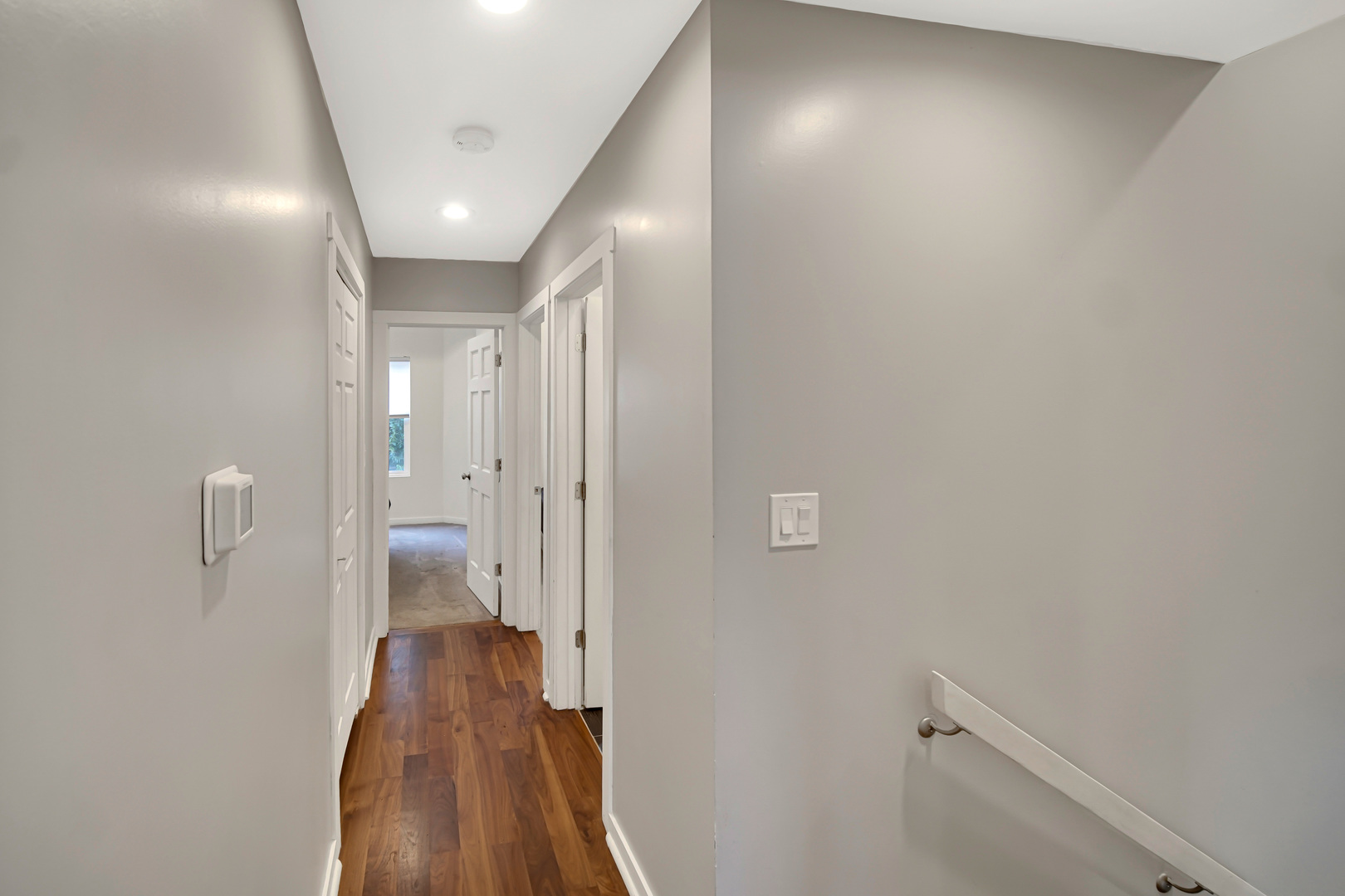 2123 West Adams Street Chicago, IL 60612 - Photo 21 of 29 a view of a hallway with wooden floor
