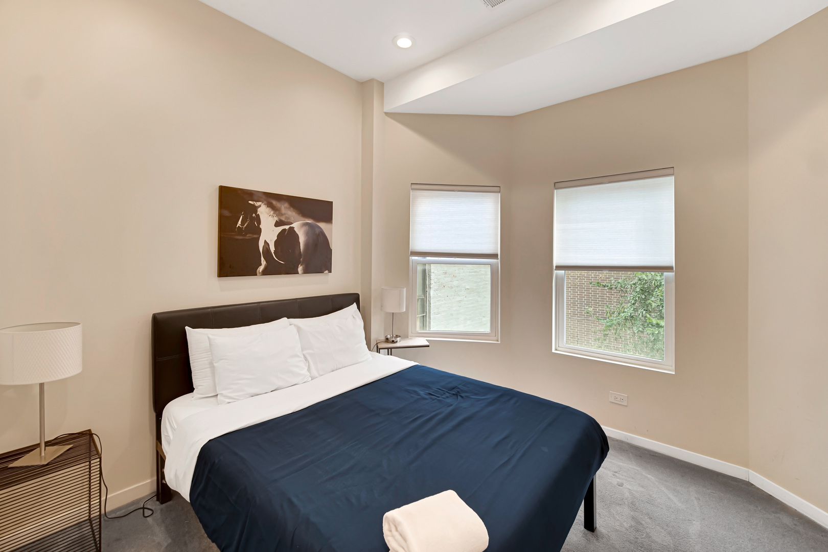 2123 West Adams Street Chicago, IL 60612 - Photo 24 of 29 a bedroom with a bed and a window