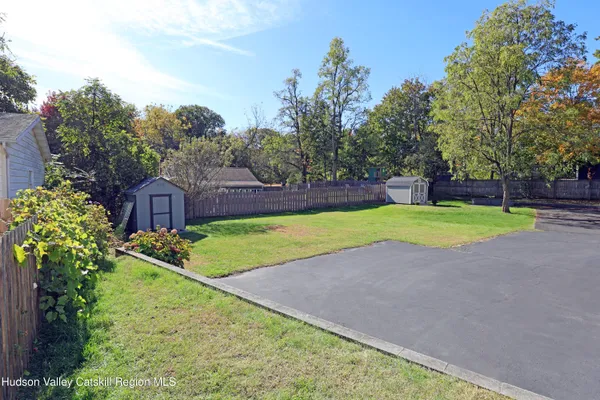 a view of a backyard with a garden