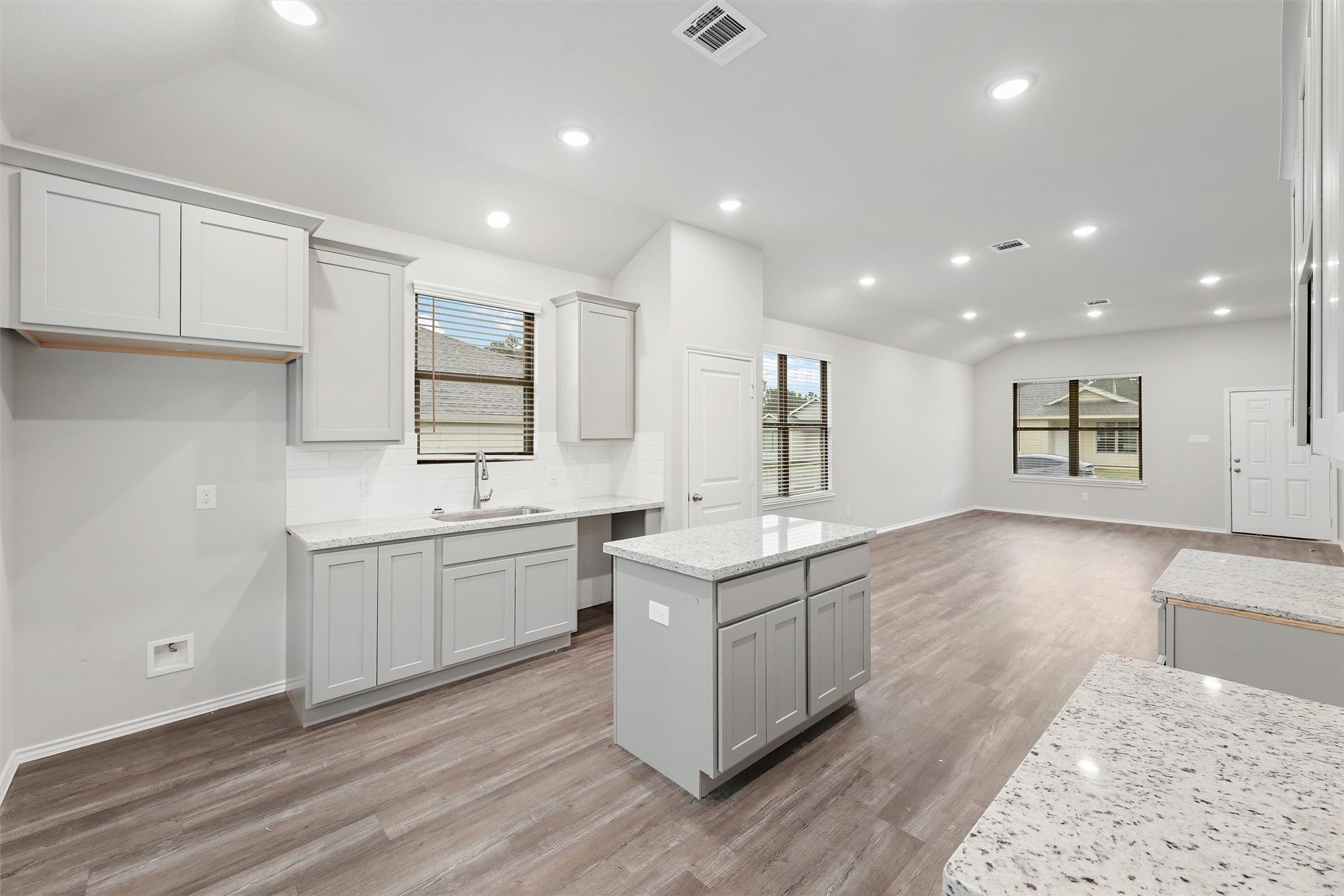 369 Byrd Drive Lufkin, TX 75901 - Photo 11 of 29 a kitchen with a sink microwave and cabinets