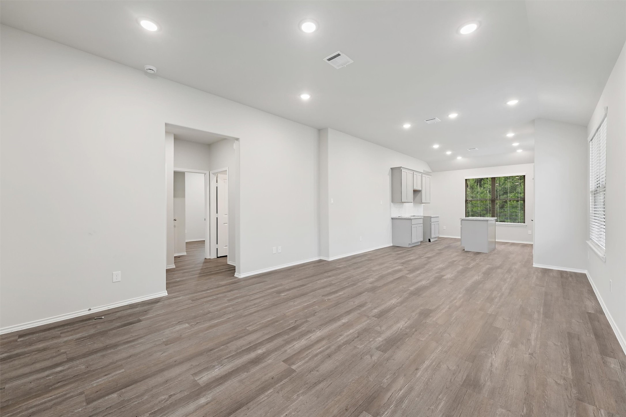 369 Byrd Drive Lufkin, TX 75901 - Photo 4 of 29 a view of empty room with wooden floor and window