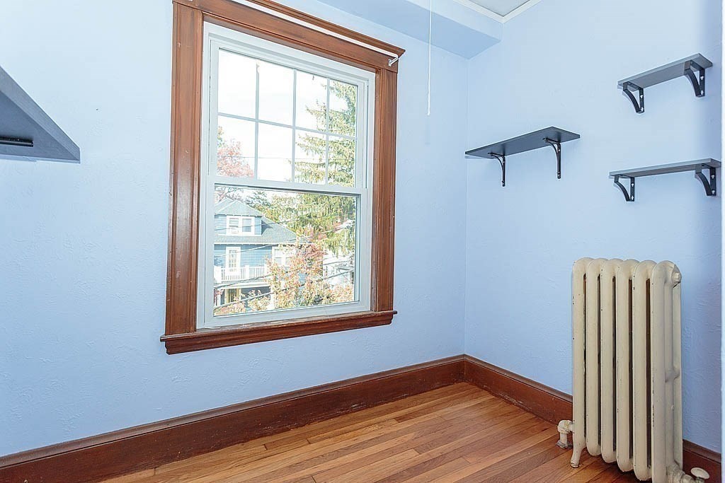 15 Fairfax Road Milton, MA 02186 - Photo 23 of 37 a view of a room with wooden floor and windows