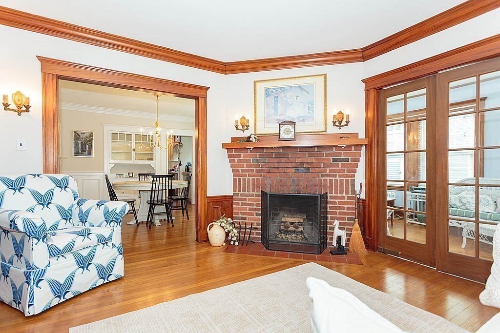 15 Fairfax Road Milton, MA 02186 - Photo 27 of 37 a living room with furniture and a fireplace