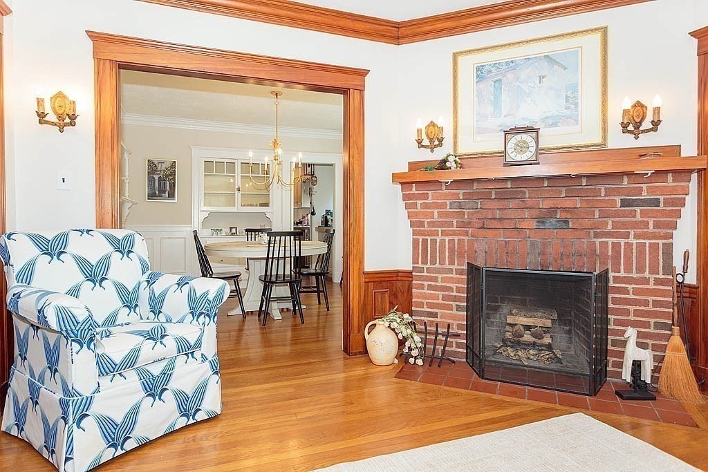 15 Fairfax Road Milton, MA 02186 - Photo 28 of 37 a living room with furniture and a fireplace
