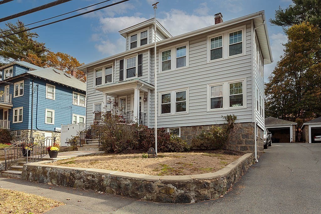 15 Fairfax Road Milton, MA 02186 - Photo 3 of 37 a front view of a house with a yard