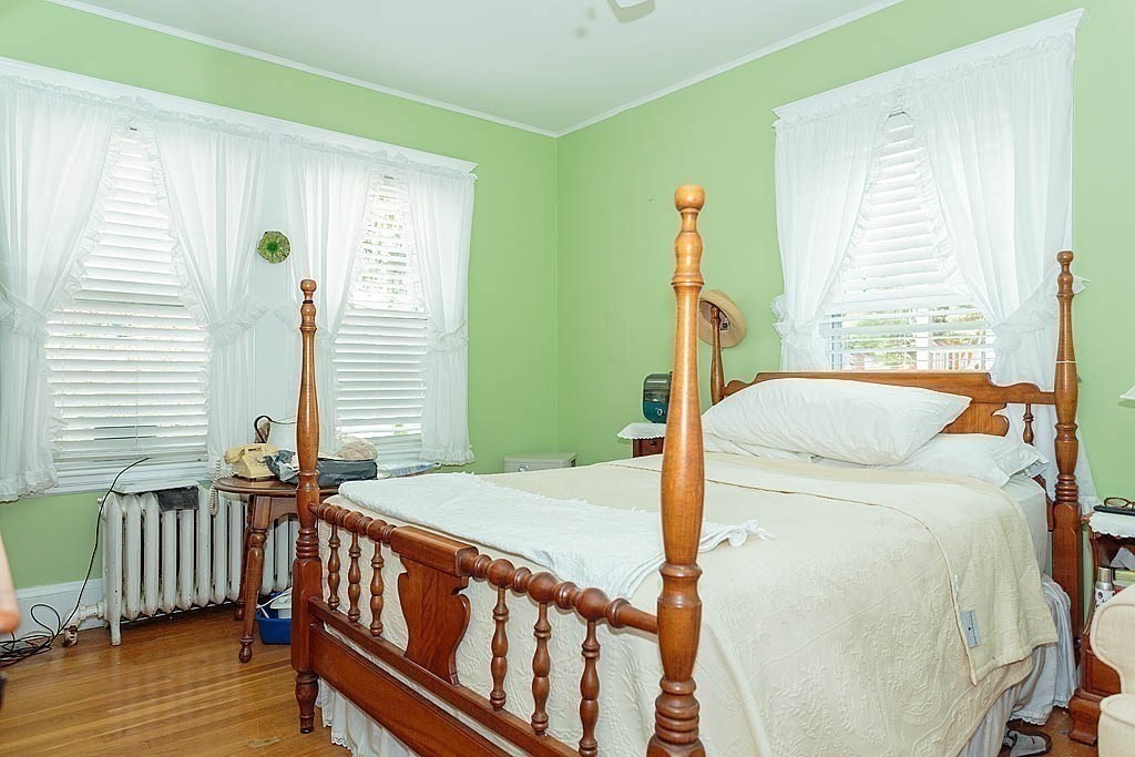 15 Fairfax Road Milton, MA 02186 - Photo 33 of 37 a bedroom with two beds and wooden floor