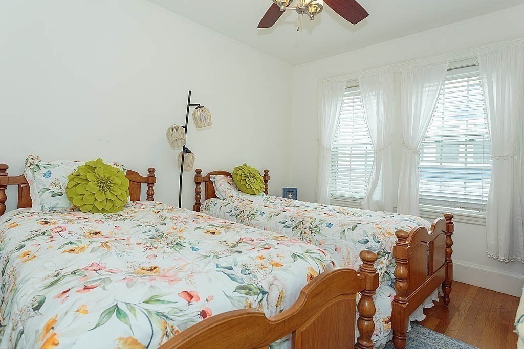 15 Fairfax Road Milton, MA 02186 - Photo 34 of 37 a bedroom with a bed and wooden floor