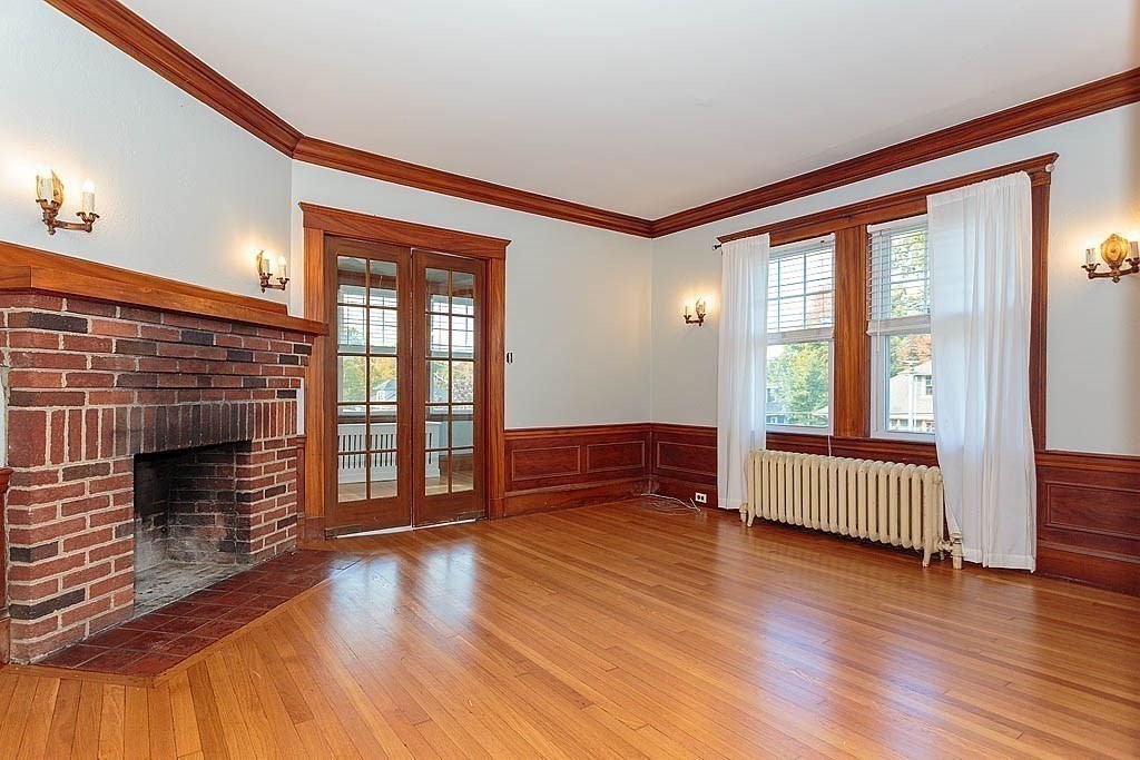 15 Fairfax Road Milton, MA 02186 - Photo 6 of 37 an empty room with wooden floor and windows